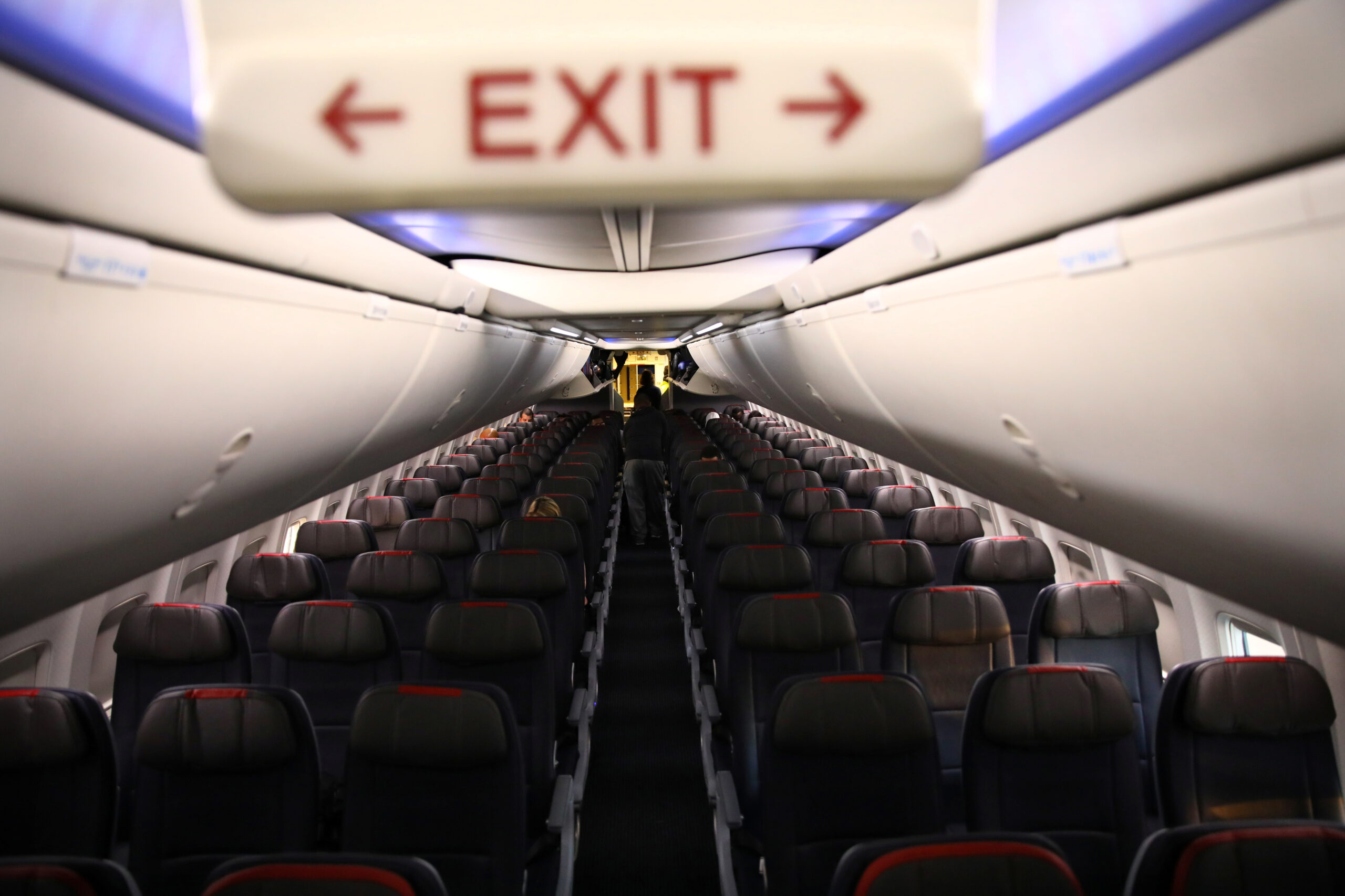 XXWEQ7NBU5OU3IJMQZJF3NS3OQ-scaled Rows of empty seats of an American Airline flight are seen, as coronavirus disease (COVID-19) disruption continues across the global industry, during a flight between Washington D.C. and Miami, in Washington, U.S., March 18, 2020. REUTERS/Carlos Barria