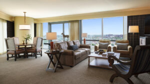 ftwdtn-omni-fort-worth-hotel-guestroom-rye-suite-living-room-300x169
